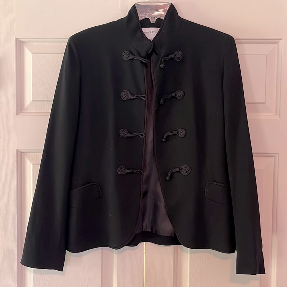 Black jacket with frog closures